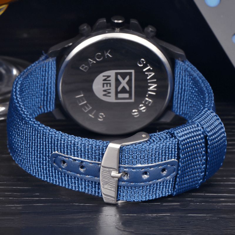 Xinew 2229D Military Casual Miesten Nylon Canvas Band Data Display Vedenpitävä Suuri Kellotaulu Urheilu Kvartsi Kello